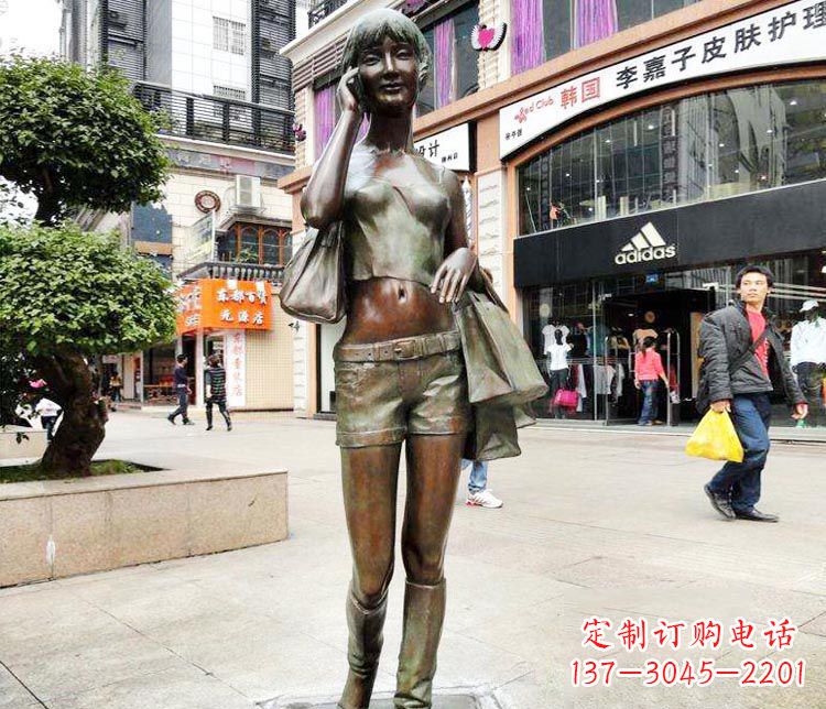 广东打电话逛街的女孩铜雕