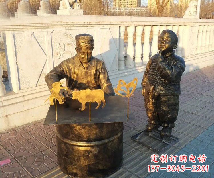 广东铜雕画糖人的人物